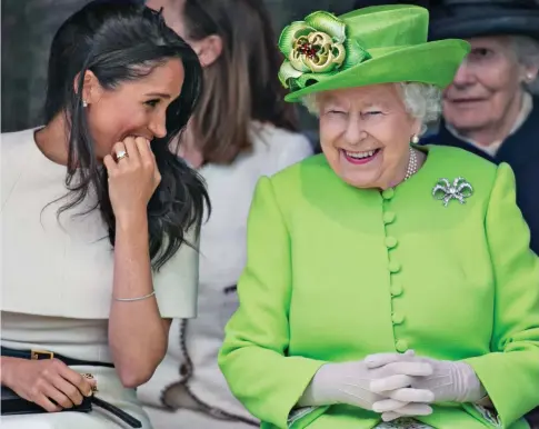  ?? ?? We are amused: Press reports of Meghan’s first royal event with the Queen, in June 2018, were glowing