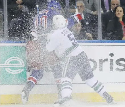  ?? — GETTY IMAGES FILES ?? Canucks coach Willie Desjardins said Troy Stecher’s rookie season reminds him of fellow defenceman Ben Hutton’s initial NHL campaign. ‘There’s a good comparison there.’