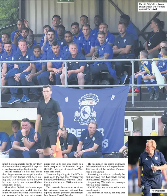  ??  ?? Cardiff City’s first-team squad watch the friendly against Taffs Well Neil Warnock