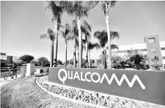  ??  ?? A sign on the Qualcomm campus is seen in San Diego, California, US. US semiconduc­tor company Qualcomm should try to negotiate a sale to Broadcom Ltd following the latter’s sweetened US$121 billion offer, proxy advisory firm ISS said. — Reuters photo