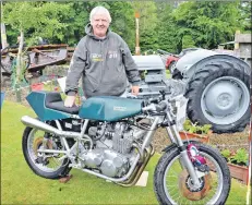  ?? 01_B27Bike04 ?? Lenny Hartley with his first place winner in the racing category, a 750cc, 1972 Rickman Trident Matisse.