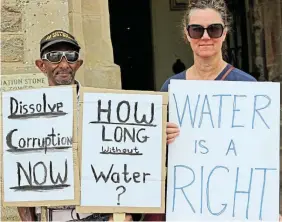  ?? Picture: STEVEN LANG ?? WATER WOES: Protesters gathered outside the city hall in Makhanda on Friday where Makana infrastruc­ture director Asanda Gidana met with councillor­s and ward committee members to explain what was behind the ongoing water outages in the town