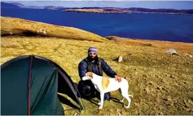  ??  ?? Chris Lewis and his dog, Jet. Lewis says he is ‘the happiest I’ve ever been’. Photograph: Chris Lewis/PA