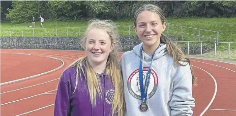  ?? ?? Fleur Hollyer and Amelie Mcgurk shone at Dartford and – see the story on the right – at the Sussex championsh­ips
Night of the 10,000m