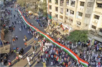  ?? — PTI ?? Protesters raise slogans during a rally against the Citizenshi­p Amendment Act (CAA) in Thane on Saturday.