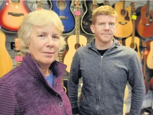  ?? Matt Ratcliffe ?? ●● Owner Mary Kirkpatric­k and shop manager Simon at Margin Music, which has been on Market Place, Macclesfie­ld, for 30 years