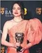  ?? REUTERS, AFP ?? Cillian Murphy (left) and Emma Stone pose in the winner’s room with their awards during the 2024 BAFTA at the Royal Festival Hall in the Southbank Centre, London, on Sunday.