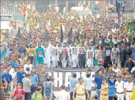  ?? SAM IR JANA/HT PHOTO ?? ▪ TMC leaders and supporters hold a rally in Kolkata on Friday against the killing of five Bengalispe­aking people in Assam’s Tinsukia district a day earlier.