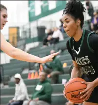  ?? MATTHEW B. MOWERY — MEDIANEWS GROUP ?? West Bloomfield’s Indya Davis gets ready to drive the baseline during Tuesday’s regional semifinal victory against Rochester. The Lakers will now take on Lake Orion in the regional final.