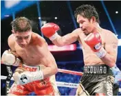  ?? PIC/PTI ?? Vargas (left) tries to avoid a punch from Pacquiao during their WBO welterweig­ht title boxing match in Las Vegas