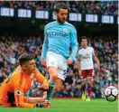  ??  ?? Nick Pope clips Bernardo Silva