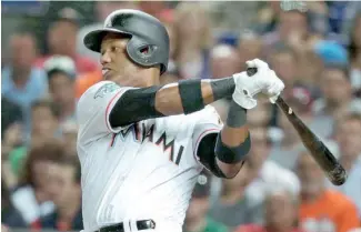  ?? AP ?? Starlin Castro remolcó una de las tres carreras de los Marlins frente a los Gigantes.