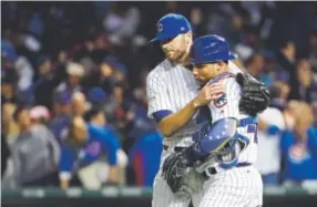  ?? Jonathan Daniel, Getty Images ?? Right-hander Wade Davis pitched in the playoffs for the Chicago Cubs this year after posting 32 saves for them in 59 relief appearance­s.