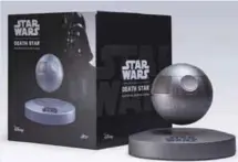  ?? — AP ?? This photo provided by Plox shows the “Star Wars” Death Star levitating bluetooth speaker. It’s a little tricky to set up, but once you get the Death Star positioned correctly over its base, it floats in the air thanks to well-placed magnets and a...
