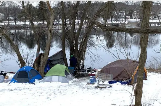  ?? MELANIE GILBERT — LOWELL SUN ?? A homeless encampment on Pawtucket Street along the Merrimack River as seen on Jan. 31, 2024.