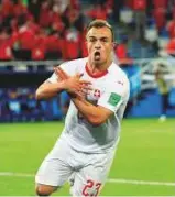  ?? Reuters ?? Switzerlan­d’s Xherdan Shaqiri makes the so-called double-eagle symbol with his hands during the match against Serbia.