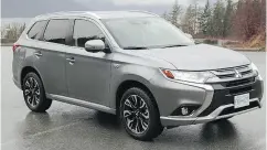  ?? GRAEME FLETCHER / DRIVING. CA ?? The 2018 Mitsubishi Outlander PHEV starts at $42,998.