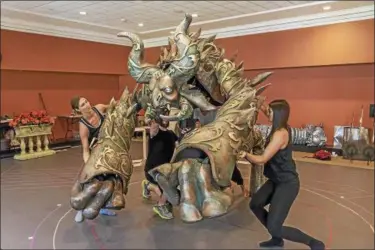  ?? PHOTO PROVIDED ?? Puppeteers rehearse with the Beast for Opera Saratoga’s production of “Beauty and the Beast.”