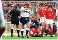  ??  ?? DESPAIR An over-exuberant Gazza fouled Garry Parker before soon suffering himself after his tackle