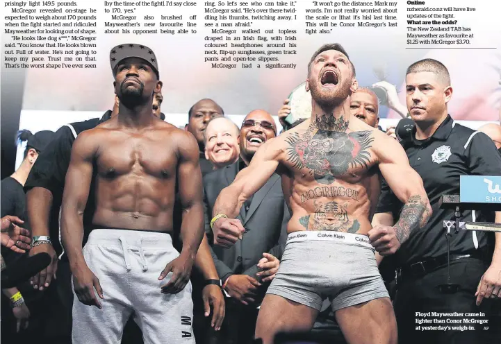  ?? AP ?? Floyd Mayweather came in lighter than Conor McGregor at yesterday’s weigh-in.