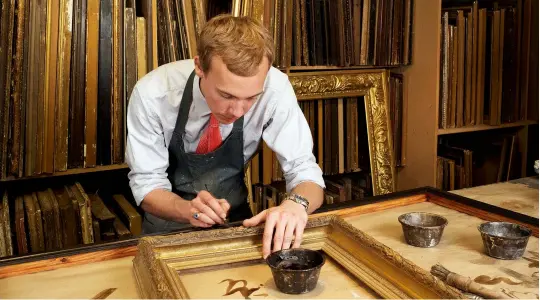  ??  ?? Below: Borys Burrough working on a frame at Rollo Whately’s shop in St James’s, London