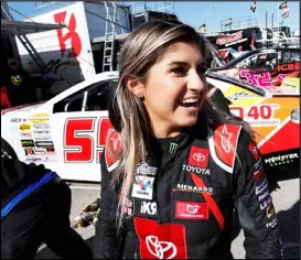  ?? Associated Press ?? DEBUT — In this Oct. 18 photo, driver Hailie Deegan greets fans after practicing for an ARCA Series auto race at Kansas Speedway in Kansas City, Kan. It’s a critical year for Deegan, the up-and-coming 18-year-old.