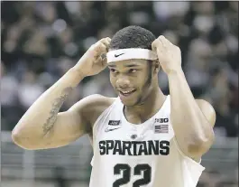  ?? CARLOS OSORIO - ASSOCIATED PRESS ?? Michigan State’s Miles Bridges prepares to shoot a free throw during Monday night’s game against Houston Baptist. Bridges scored 33points in the No. 2Spartans’ victory.