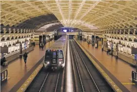  ?? AP PHOTO/PATRICK SEMANSKY ?? A train arrives at Metro Center station April 23 in Washington, D.C.