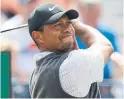  ?? MARTIN CLEAVER/THE ASSOCIATED PRESS ?? Tiger Woods four back after sizzling 66.