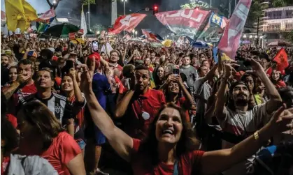  ?? Photograph: Sopa Images/Rex/Shuttersto­ck ?? Supporters of Luiz Inácio Lula da Silva in Belo Horizonte, Brazil, celebrate his victory.