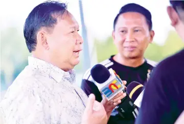  ??  ?? Juil speaking to reporters at the Kota Kinabalu Sports Complex yesterday.