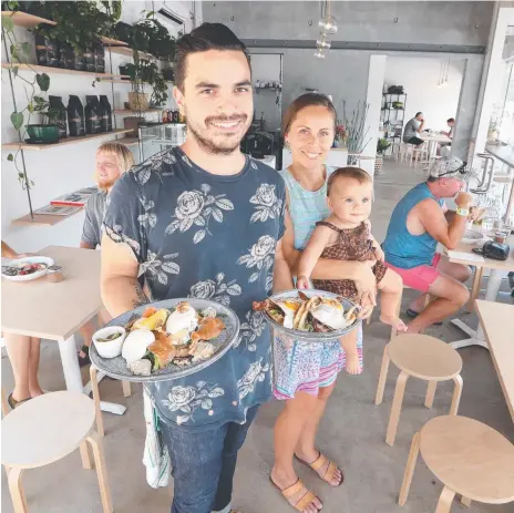  ?? Photo: Richard Gosling ?? Kaycee and Kelly Hapi, pictured with daughter Harlow, run Hymn Coffee at Tweed Heads.