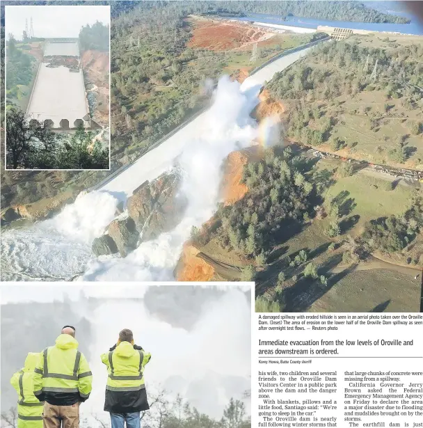  ??  ?? California Department of Water Resources personnel monitor water flowing through the damaged spillway on the Oroville Dam. — Reuters photo A damaged spillway with eroded hillside is seen in an aerial photo taken over the Oroville Dam. (Inset) The area...