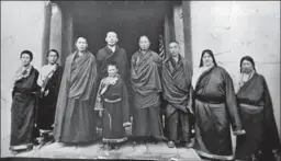  ??  ?? GONPO TSO, foreground, with her father, the king, Rapten Tinley, fourth from left, and others in Aba, a predominan­tly Tibetan city in China.