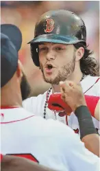  ?? STAFF PHOTO BY MATT WEST ?? NOT ENOUGH THIS TIME: Andrew Benintendi homered again last night, but the Red Sox dropped a 7-3 decision to the Indians at Fenway.