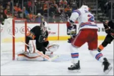  ?? DERIK HAMILTON — THE ASSOCIATED PRESS ?? Flyers goaltender Calvin Pickard makes a save on a shot from Rangers’ Kevin Shattenkir­k (22) during the third period of a 4-0 win.