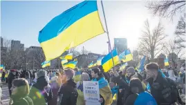  ?? Picture: AFP ?? UP IN ARMS. People at a rally in Boston, the United States, on Saturday to mark the second anniversar­y of Russia’s invasion of Ukraine.