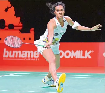  ?? —
AFP ?? P. V. Sindhu reacts during her BWF World Tour Finals semifinal match against Japan’s Akane Yamaguchi in Nusa Dua on the resort island of Bali in Indonesia, in this handout photo released by the Badminton Associatio­n of Indonesia.