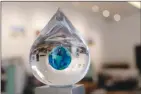  ?? Associated Press photo ?? The XPrize trophy is seen at The Skysource/Skywater Alliance offices last week in Los Angeles.