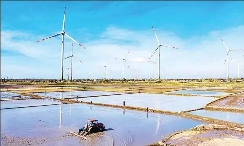  ?? TRUNG NAM GROUP/VIET NAM NEWS ?? Trung Nam Group’s 151.95MW wind farm in Vietnam’s Ninh Thuan province was finished and began delivering clean energy last month. It is so far the largest in the country, where many other wind farms are being built and planned.