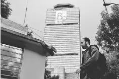  ?? — Reuters photo ?? A sign to commemorat­e the 80th anniversar­y of the founding of state-owned enterprise Pemex is seen on the facade of its headquarte­rs in Mexico City, Mexico. Mexico’s powerful CCE business lobby urged the leftist front-runner for a July 1 presidenti­al...