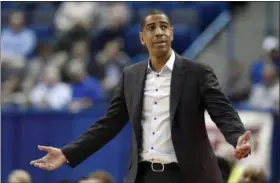  ?? JESSICA HILL — ASSOCIATED PRESS FILE ?? In a February 2018 photo, Connecticu­t head coach Kevin Ollie reacts during a game against Tulsa in Hartford, Conn.