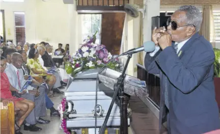  ??  ?? Michael Gordon, husband of the late Angela Reid-gordon, delivering his lasting love via the harmonica.