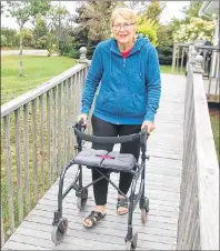  ?? +*. %": 5)& (6"3%*"/ ?? Christine MacCallum, 64, of Marshfield uses a walker when she ventures out for a stroll. MacCallum is urging more people who have had an ostomy to attend a peer group she started in May.