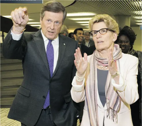  ?? STAN BEHAL / POSTMEDIA NEWS FILES ?? Toronto Mayor John Tory and Ontario Premier Kathleen Wynne are at loggerhead­s over the city’s transit funding, with the mayor saying the province isn’t matching federal contributi­ons, John Ivison writes.