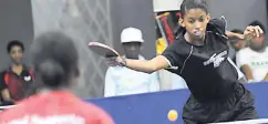  ?? FILE ?? Yvonne Foster plays a back-hand shot during a recent table tennis competitio­n.