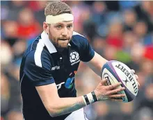  ??  ?? Scotland’s Finn Russell in action against Wales.