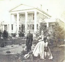  ?? SPECIAL TO THE EXAMINER ?? Robert and Charlotte Nicholls in front of their home at 415 Rubidge Street, now the Masonic Temple. (Trent Valley Archives)