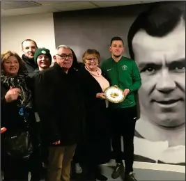  ??  ?? James McGrory’s family visit St Roch’s FC to donate an award to the club