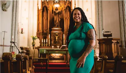  ?? JAMES FOSTER PHOTOS/FOR THE SUN-TIMES ?? The Rev. Nicolette Peñaranda is the new pastor at First Lutheran Church of the Trinity, a congregati­on with a history of activism.